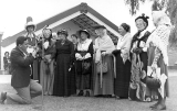 Piripi Munroe, M.C. leads the Paeroa Historical Society group in song